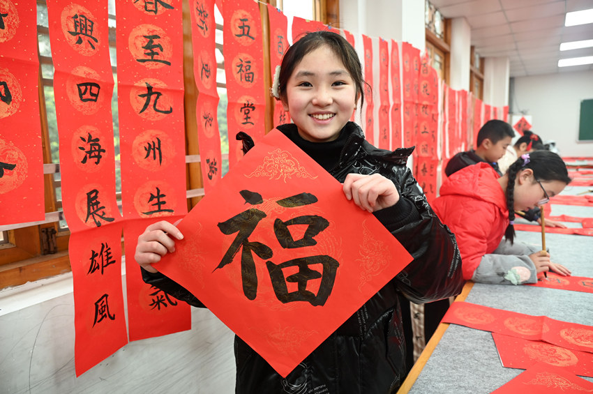 墨香送祝福。蘭自濤攝